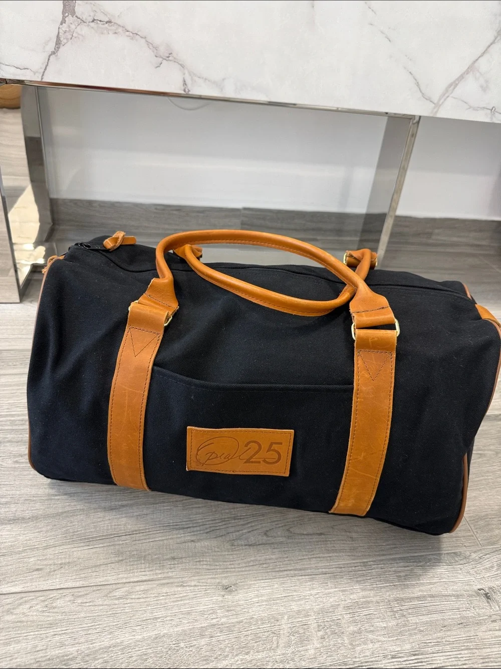 Classic Black Canvas Duffel with Tan Leather Trim